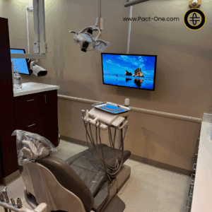 Example of wall mounted TV for patient viewing in group dental practice